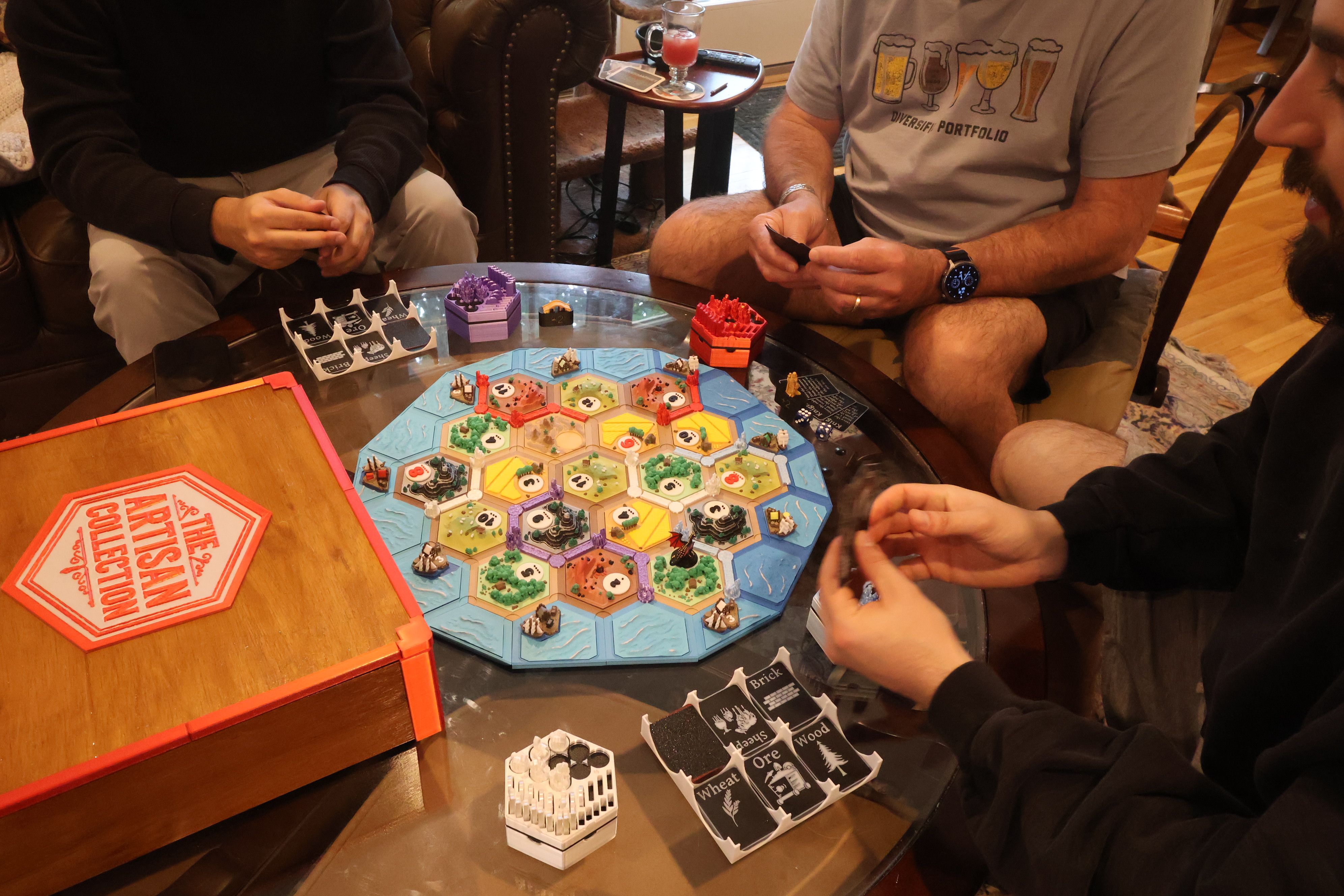 Catan Artisan set in active gameplay on a dinner table