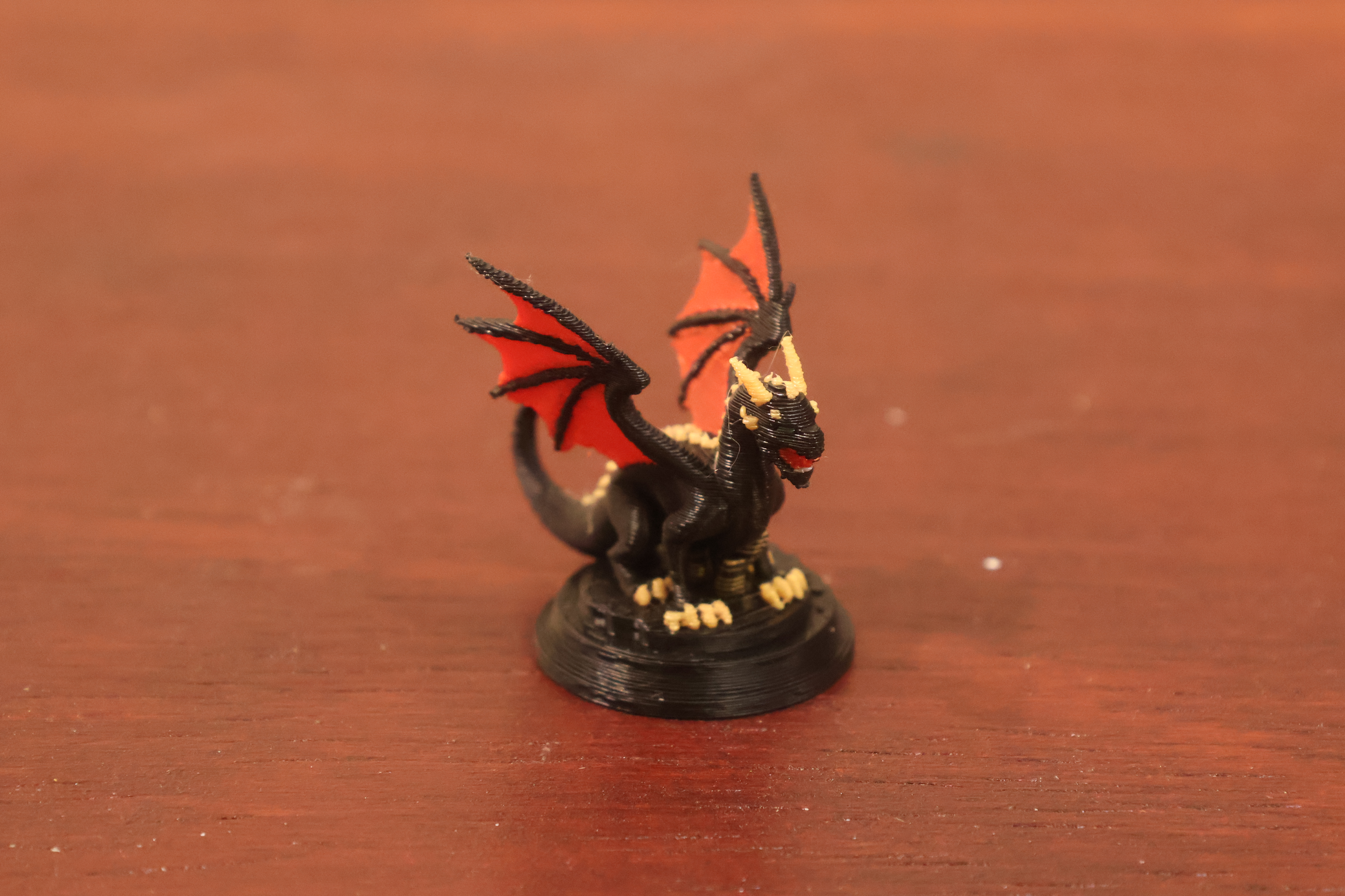 Custom 3D printed Catan robber figurine, hand-sculpted from a customer photo