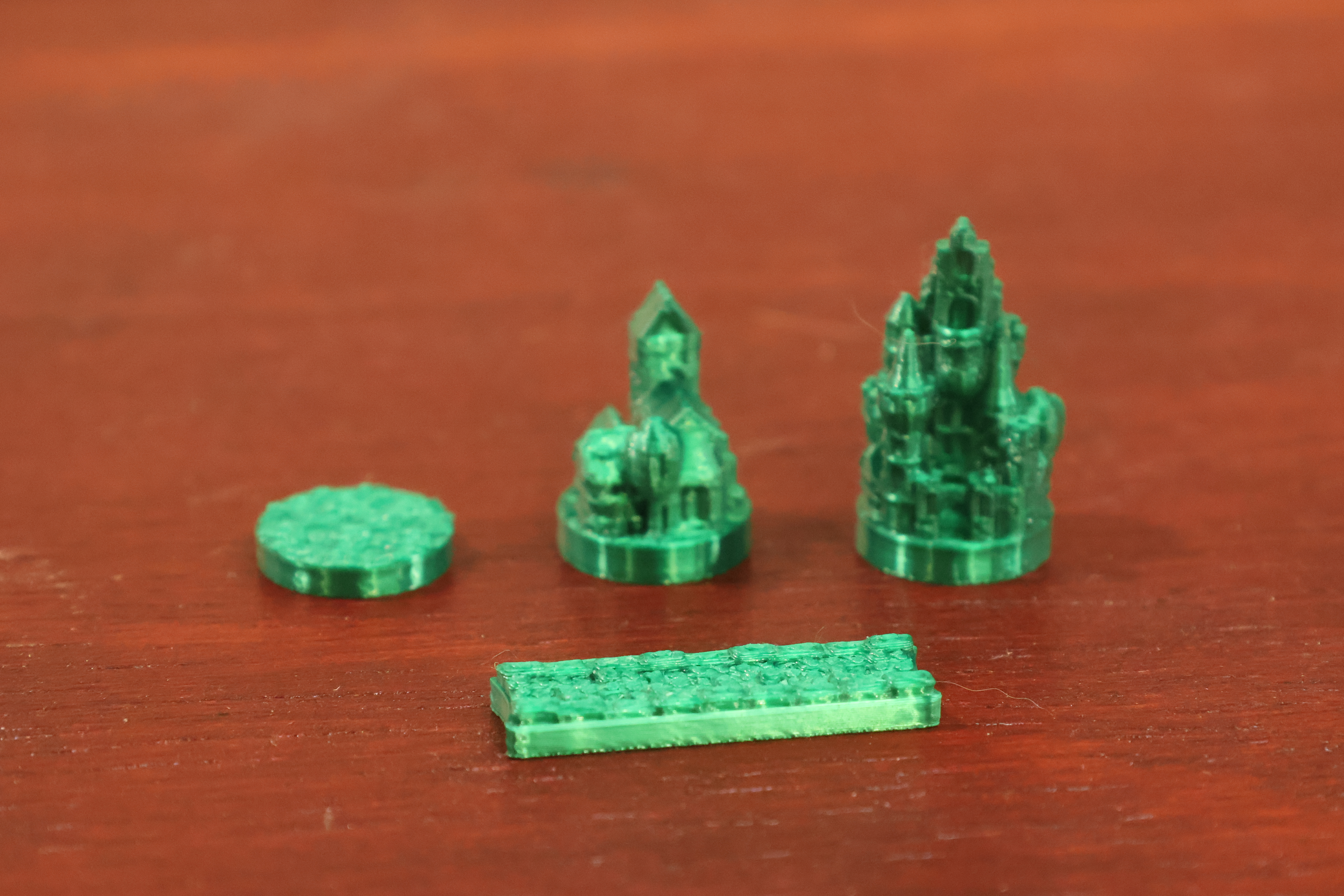 Premium silk-textured Catan player pieces in shimmering yellow Bambu Studios Silk+ filament