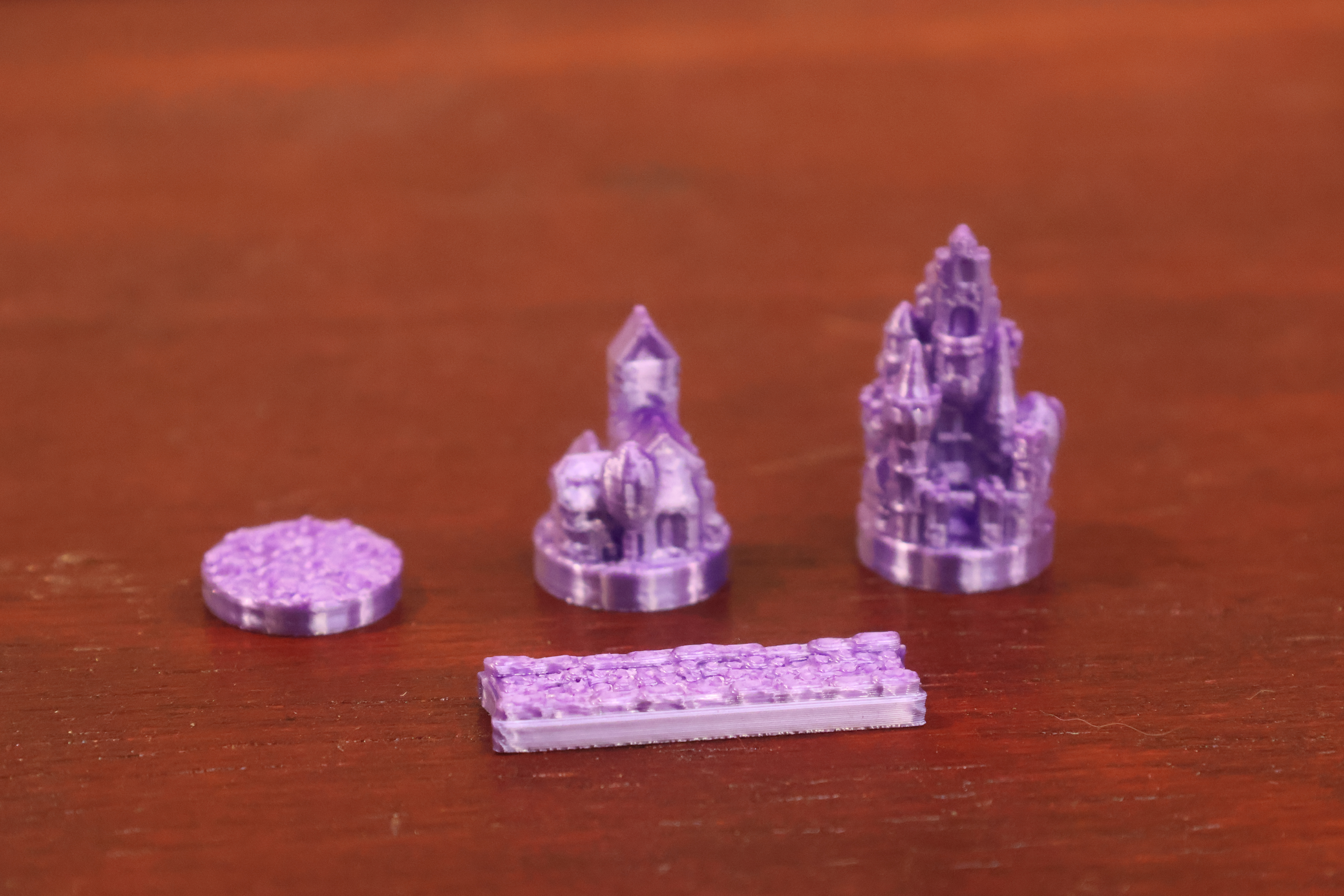 A full set of purple silk-finish settlements, cities and roads with a soft pearlescent sheen