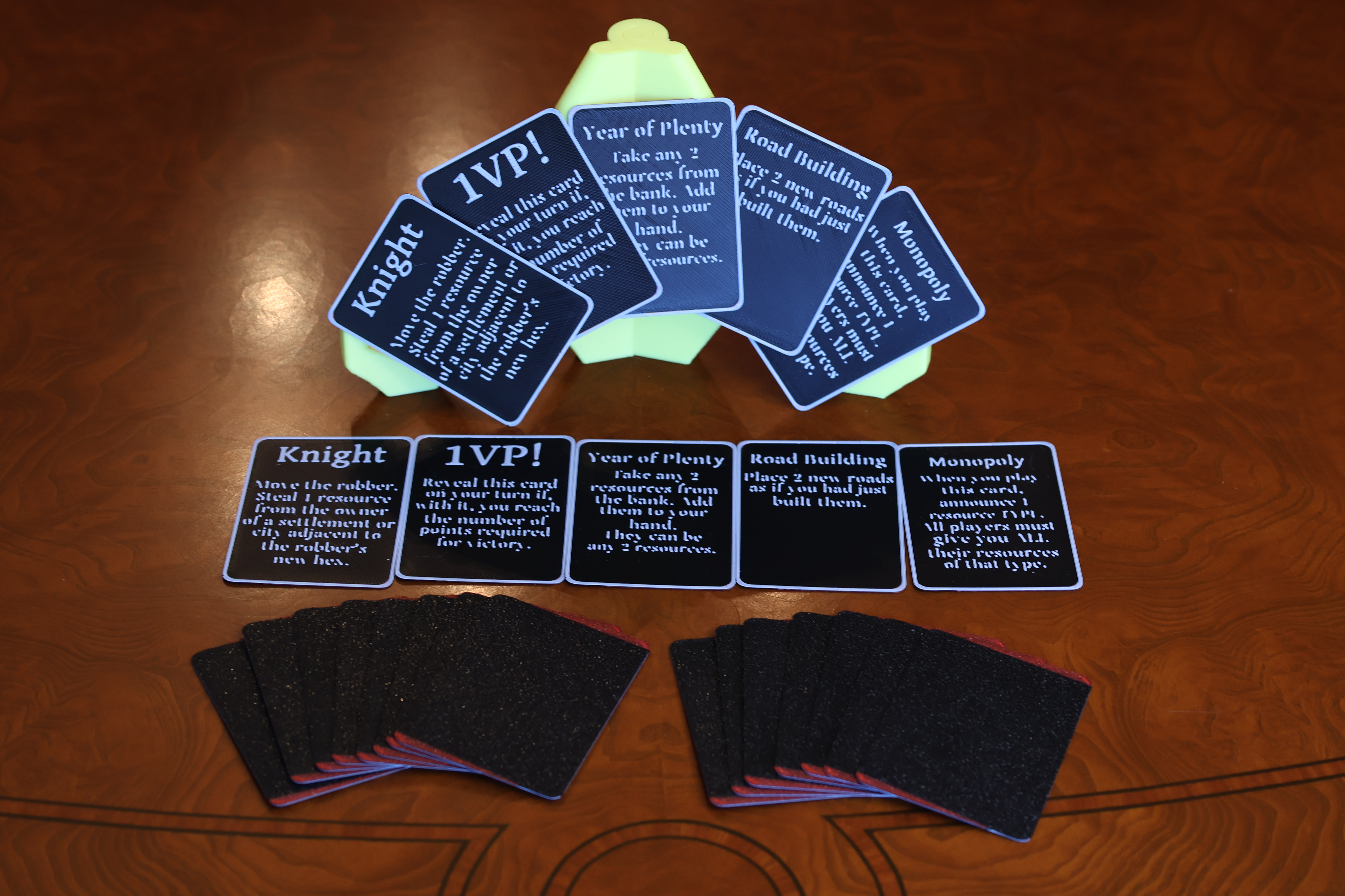 A fan of development cards showing rich color and clean edge finishing