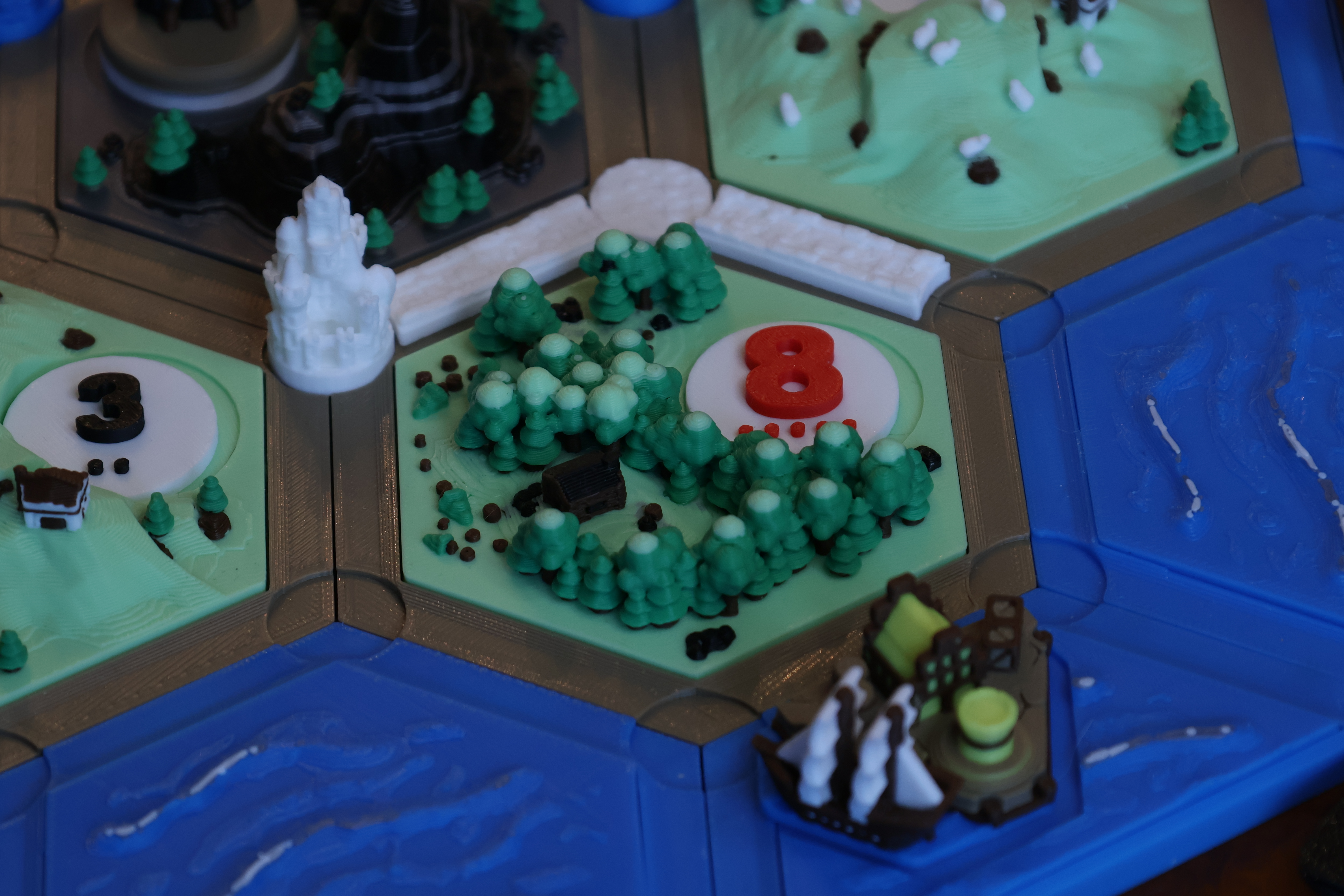 In-play detail of a lush grass tile on the fully assembled magnetic board