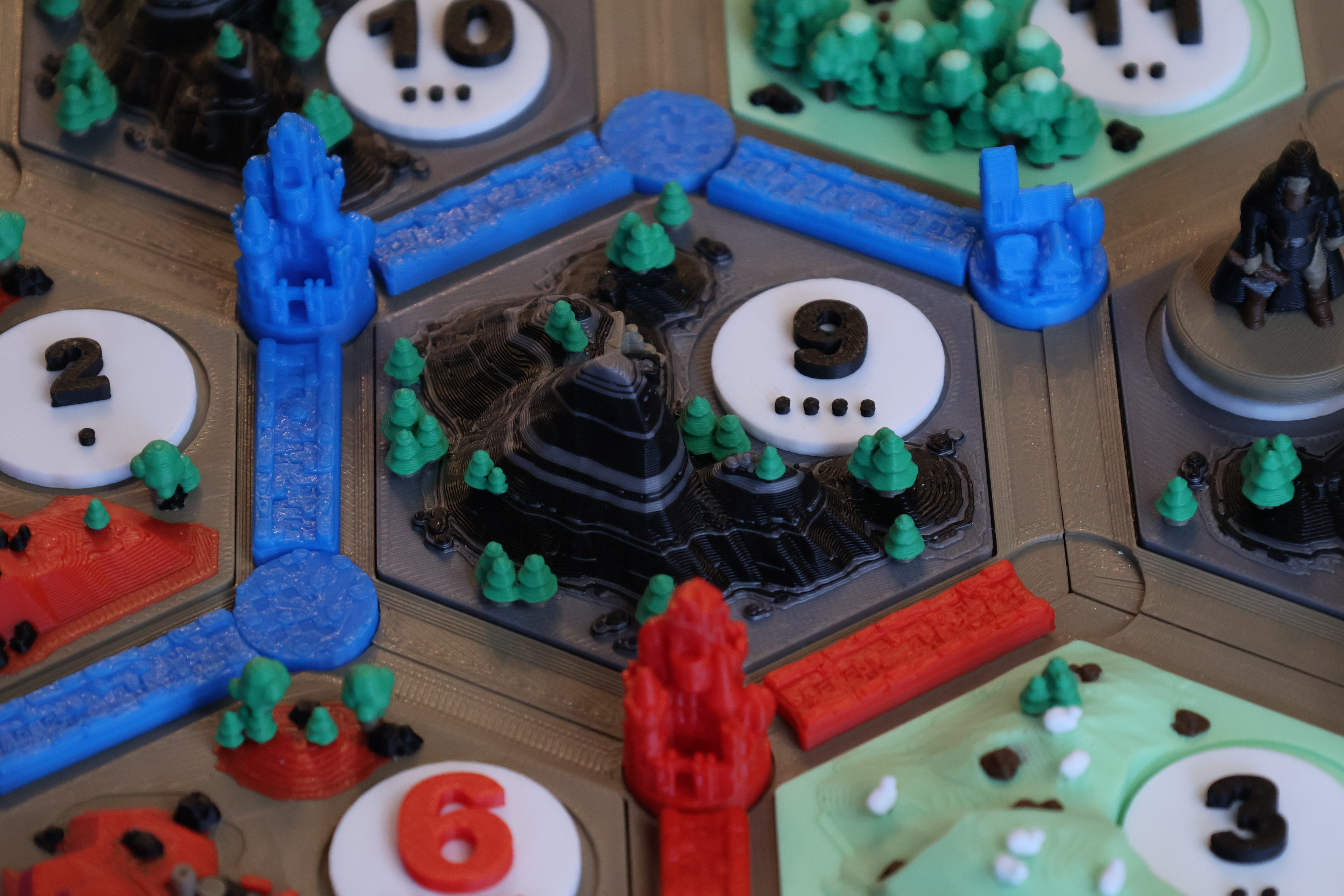 In-play detail of an ore tile with cities snapped firmly into place